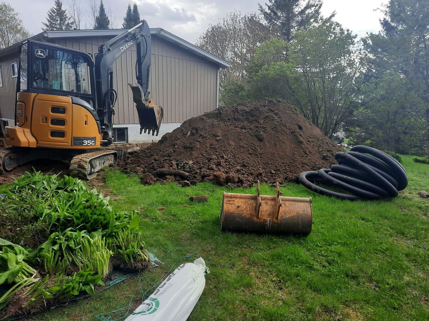 Mini-excavatrice fosse septique tuyau drainage résidentiel
